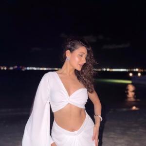 Bollywood Beauty Pragya Jaiswal Rocks a Glamorous White Ensemble