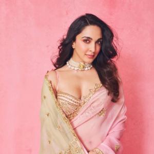 Kiara Advani in Pink and Green Saree with Pearl Necklace