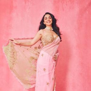 Kiara Advani in Pink and Green Saree with Pearl Necklace