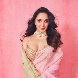 Kiara Advani in Pink and Green Saree with Pearl Necklace