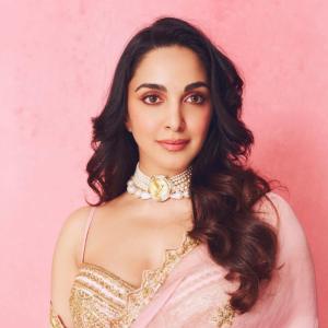 Kiara Advani in Pink and Green Saree with Pearl Necklace