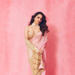 Kiara Advani in Pink and Green Saree with Pearl Necklace