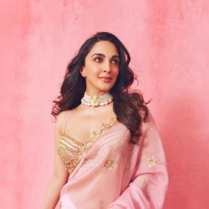 Kiara Advani in Pink and Green Saree with Pearl Necklace
