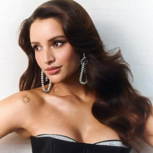 Actress Tripti Dimri Stuns in a Glamorous Portrait with Elegant Accessories