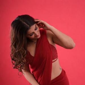 Yashika Anand Stunning in Vibrant Red Saree