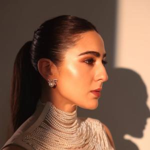 Actress Sara Ali Khan in Chic Pearl Necklace Ensemble