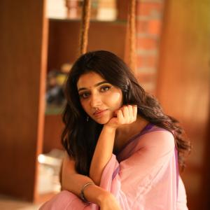Mirnaa Looks Graceful in Pink Saree Photoshoot