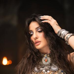 Nora Fatehi Stunning Dance Pose in Silver Mirror-Coin Costume