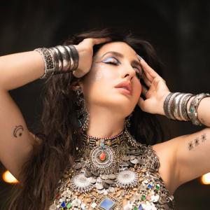 Nora Fatehi Stunning Dance Pose in Silver Mirror-Coin Costume