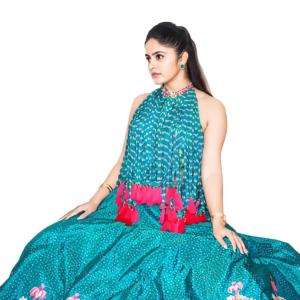 Pragya Nayan in Vibrant Teal Floral Dress with Pink Tassels