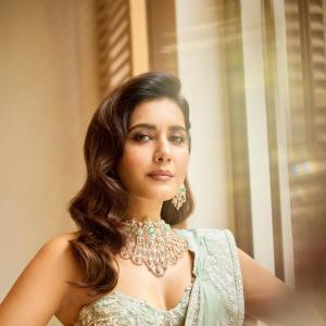Rashi Khanna in Elegant Mint Green Saree with White Embroidery