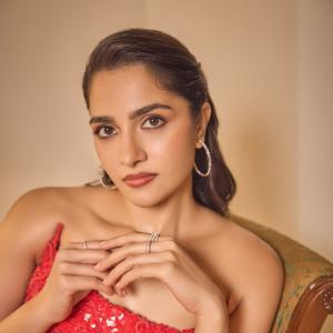 Rukmini Vasanth shines in elegant red gown look