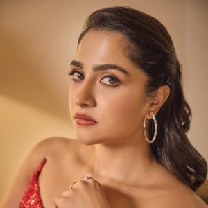 Rukmini Vasanth shines in elegant red gown look