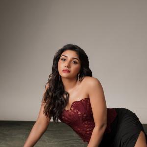 Actress Mirnaa stuns in maroon corset look in fashion photoshoot