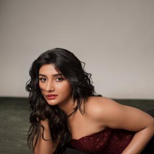 Actress Mirnaa stuns in maroon corset look in fashion photoshoot