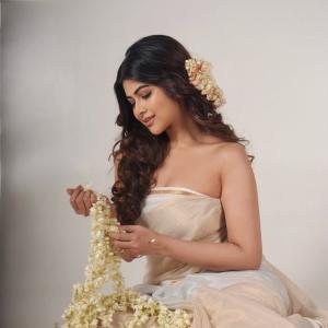 Srijita Ghosh stuns in elegant off-white saree floral photoshoot