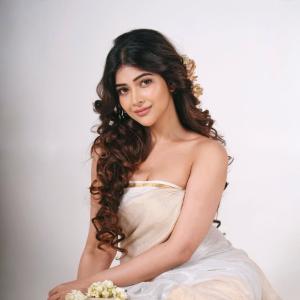 Srijita Ghosh stuns in elegant off-white saree floral photoshoot