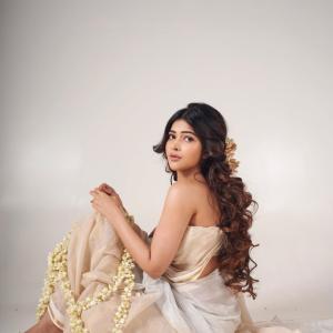 Srijita Ghosh stuns in elegant off-white saree floral photoshoot