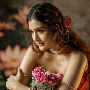 Payal Rajput stuns in orange saree with floral ceremonial look