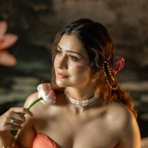 Payal Rajput stuns in orange saree with floral ceremonial look