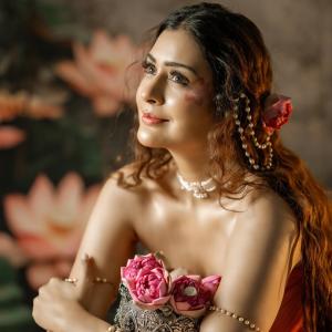 Payal Rajput stuns in orange saree with floral ceremonial look