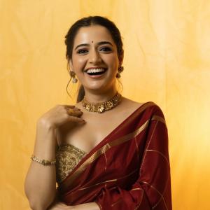 Ashika Rangnath graceful ethnic look in golden light