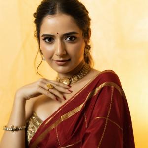 Ashika Rangnath graceful ethnic look in golden light