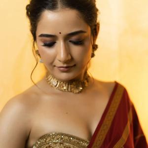 Ashika Rangnath graceful ethnic look in golden light