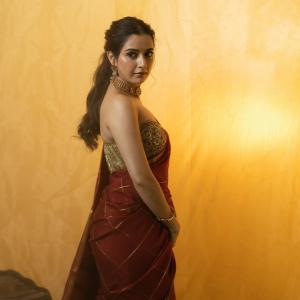 Ashika Rangnath graceful ethnic look in golden light