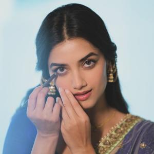 Actress BhagyaSree Borse Stuns in Purple and Green Lehenga