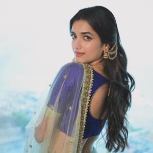 Actress BhagyaSree Borse Stuns in Purple and Green Lehenga