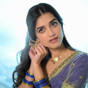 Actress BhagyaSree Borse Stuns in Purple and Green Lehenga