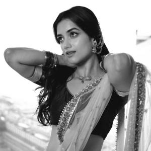 Actress BhagyaSree Borse Stuns in Purple and Green Lehenga