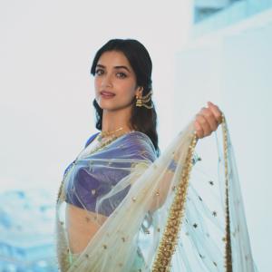 Actress BhagyaSree Borse Stuns in Purple and Green Lehenga