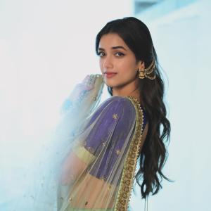Actress BhagyaSree Borse Stuns in Purple and Green Lehenga