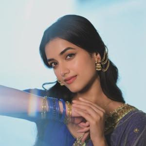 Actress BhagyaSree Borse Stuns in Purple and Green Lehenga