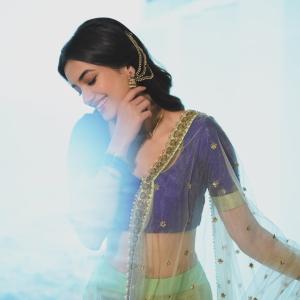 Actress BhagyaSree Borse Stuns in Purple and Green Lehenga