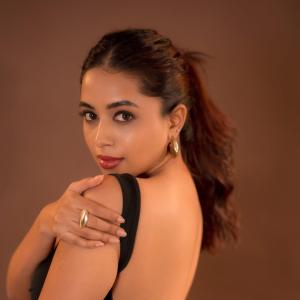 Actress Rithika Chakraborty Stuns in a Black Backless Gown