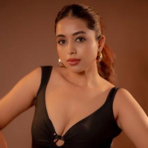 Actress Rithika Chakraborty Stuns in a Black Backless Gown