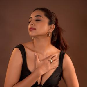 Actress Rithika Chakraborty Stuns in a Black Backless Gown