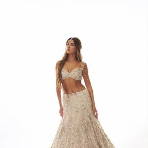 Ananya Panday Shines in an Ivory Embellished Lehenga