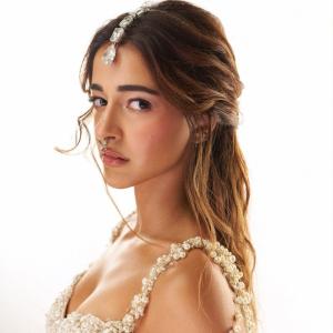 Ananya Panday Shines in an Ivory Embellished Lehenga