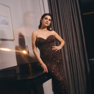 Shraddha Das Stuns in a Dark Maroon Embellished Gown