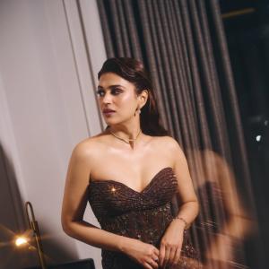 Shraddha Das Stuns in a Dark Maroon Embellished Gown