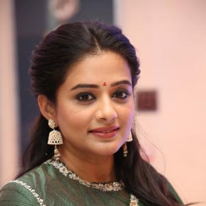 Priyamani Looks Regal in an Elegant Dark Green Saree