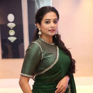 Priyamani Looks Regal in an Elegant Dark Green Saree