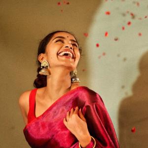 Anupama Parameswaran Shines in Red and Magenta Saree