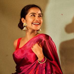 Anupama Parameswaran Shines in Red and Magenta Saree