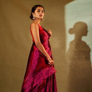 Anupama Parameswaran Shines in Red and Magenta Saree