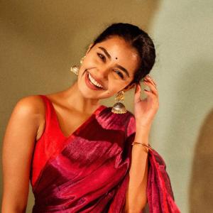 Anupama Parameswaran Shines in Red and Magenta Saree